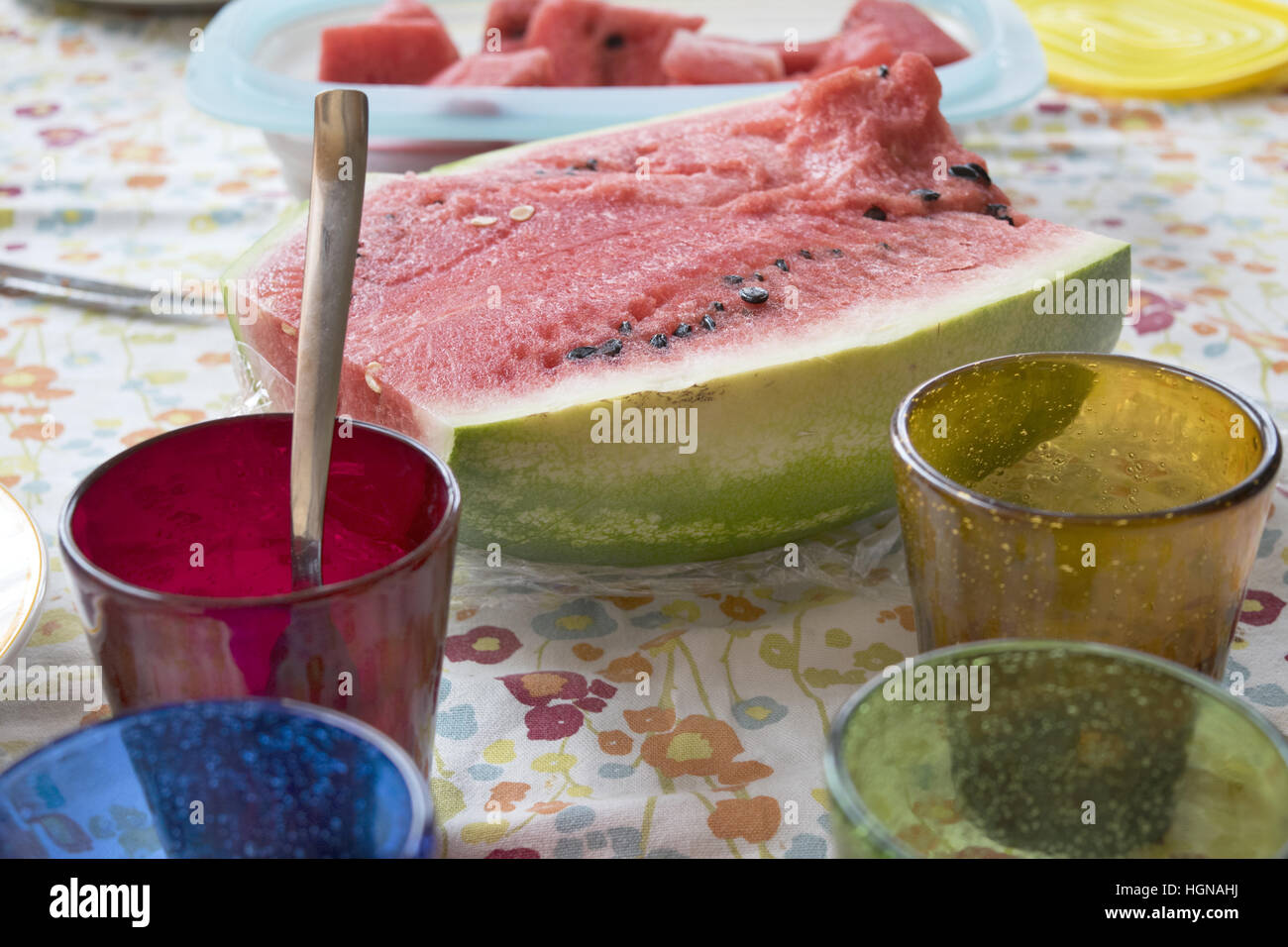 watermelon cut half on a set table at lunch end Stock Photo