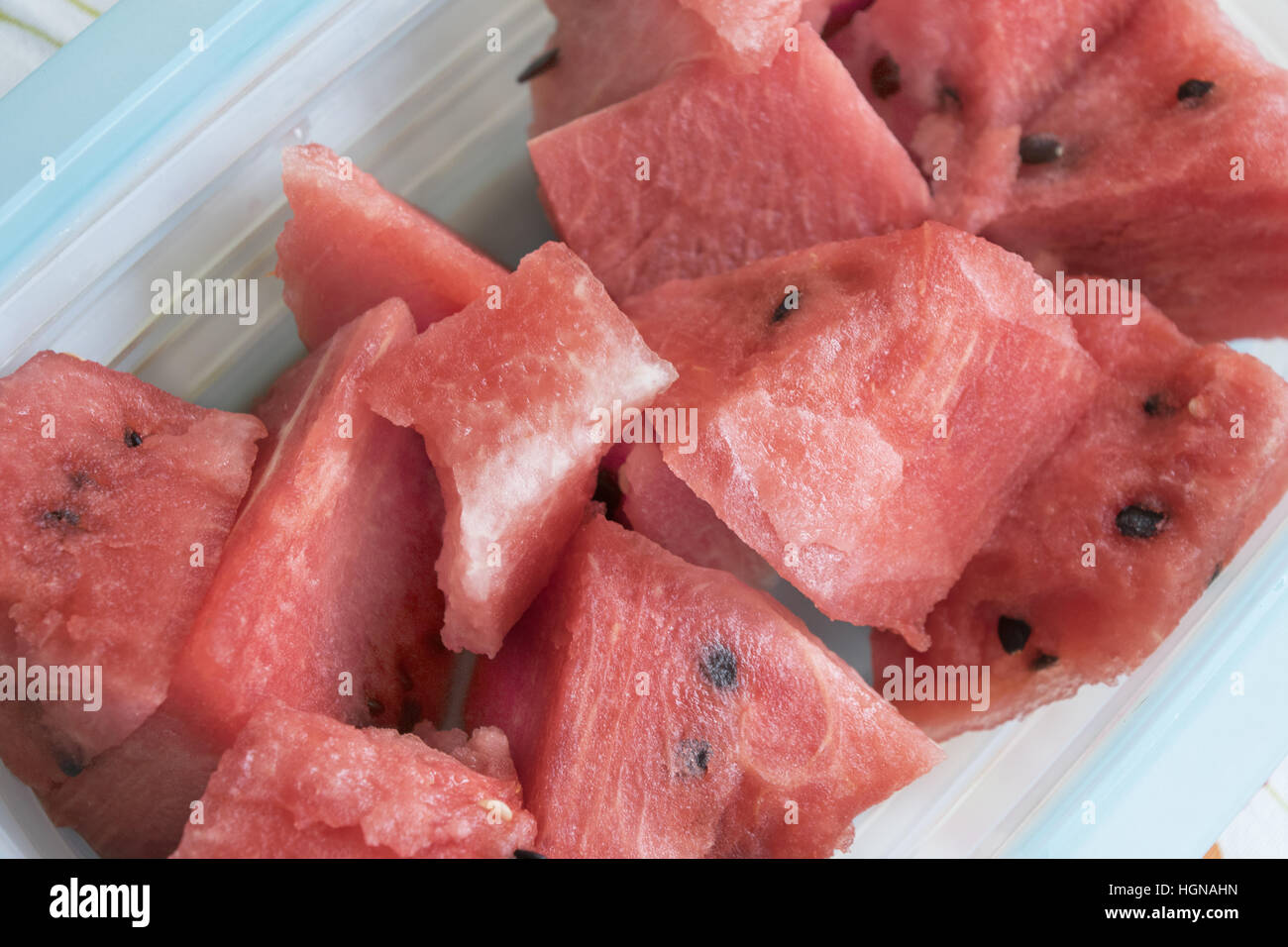 fresh summer watermelon cut in cube to prepare fruit salad Stock Photo