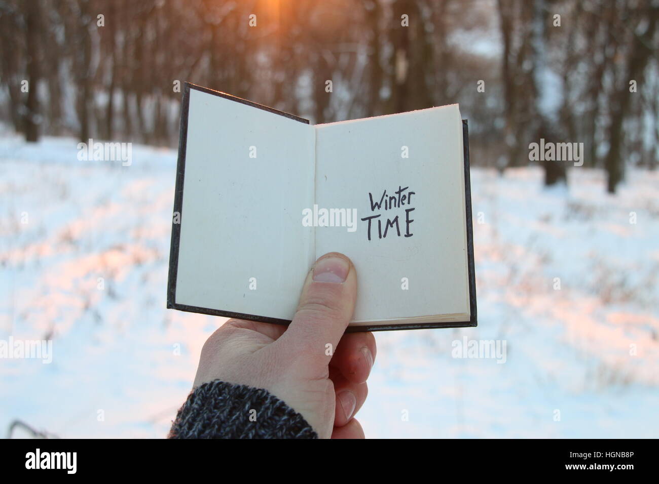 Winter time idea. Book and text. Stock Photo