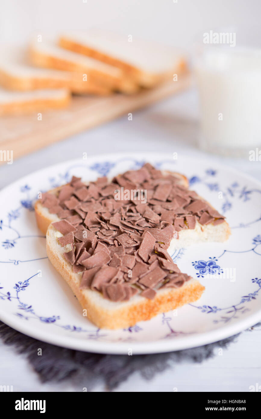 A sandwich with chocolate sprinkles or 'vlokken', Dutch traditional food. Stock Photo