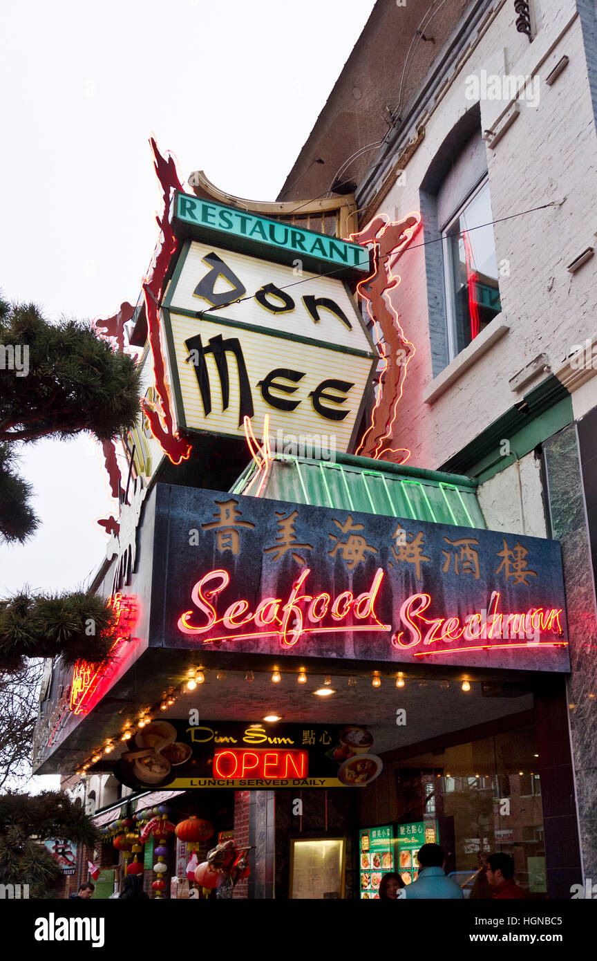 Outdoor neon sign for the famous Don Mee Chinese restaurant in Chinatown, Victoria, British Columbia, Canada.  Victoria BC Chinatown. Stock Photo