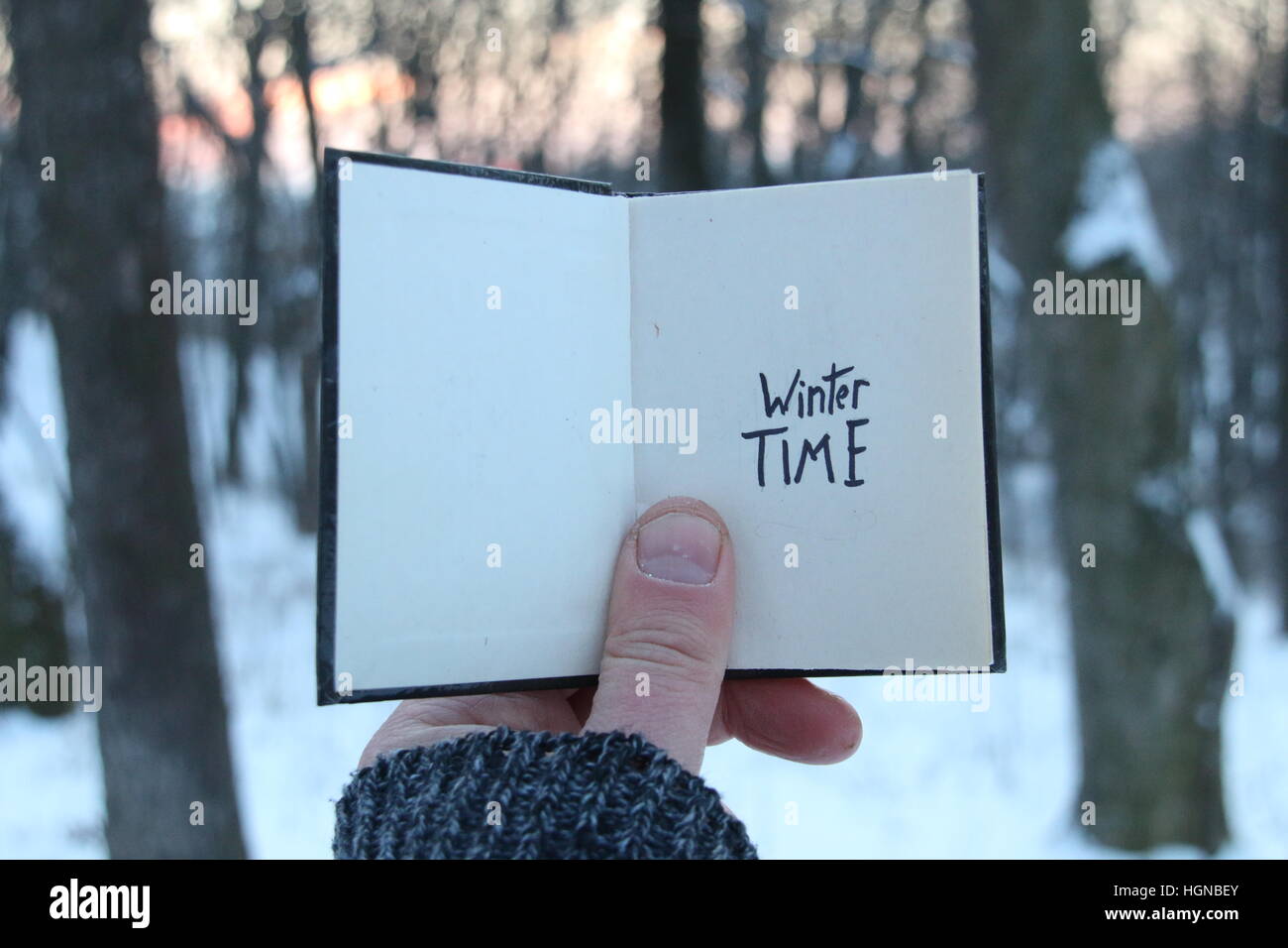 Winter time idea. Book and text. Stock Photo