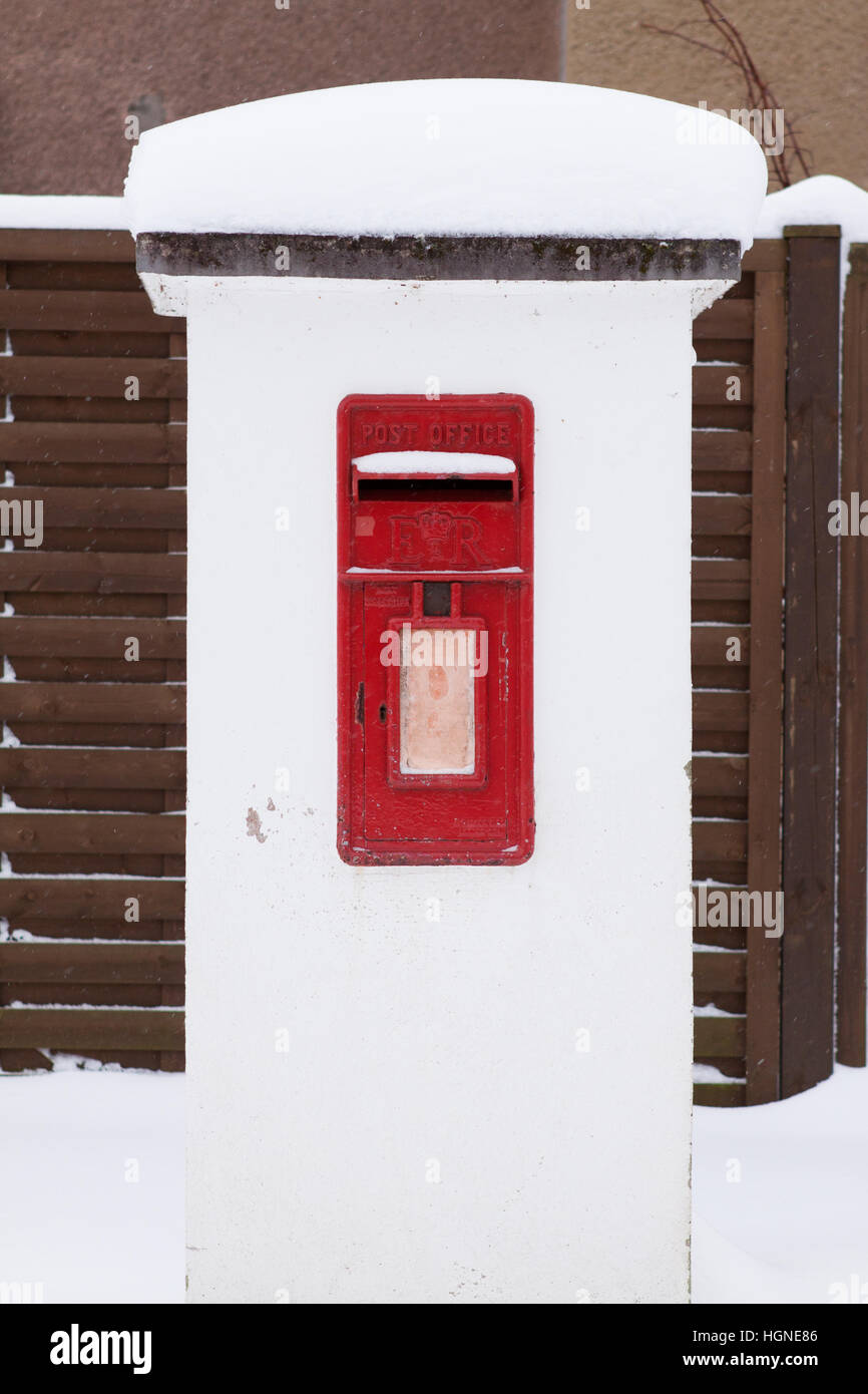 A postbox under several inches of snow after one of the heaviest snowfalls seen on JHQ in several years. Stock Photo