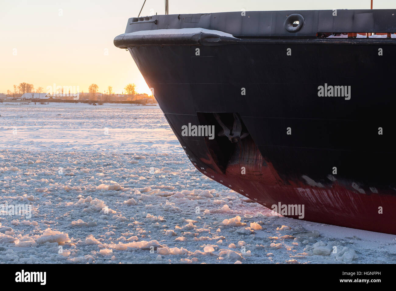 Icebreaker in the river ice. Nose of ship. Stock Photo