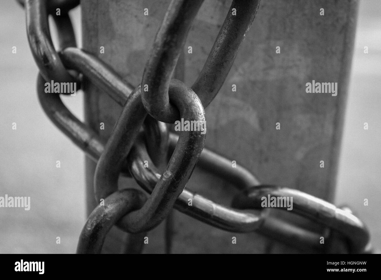 Close-up view of old rusty chain links. Stock Photo