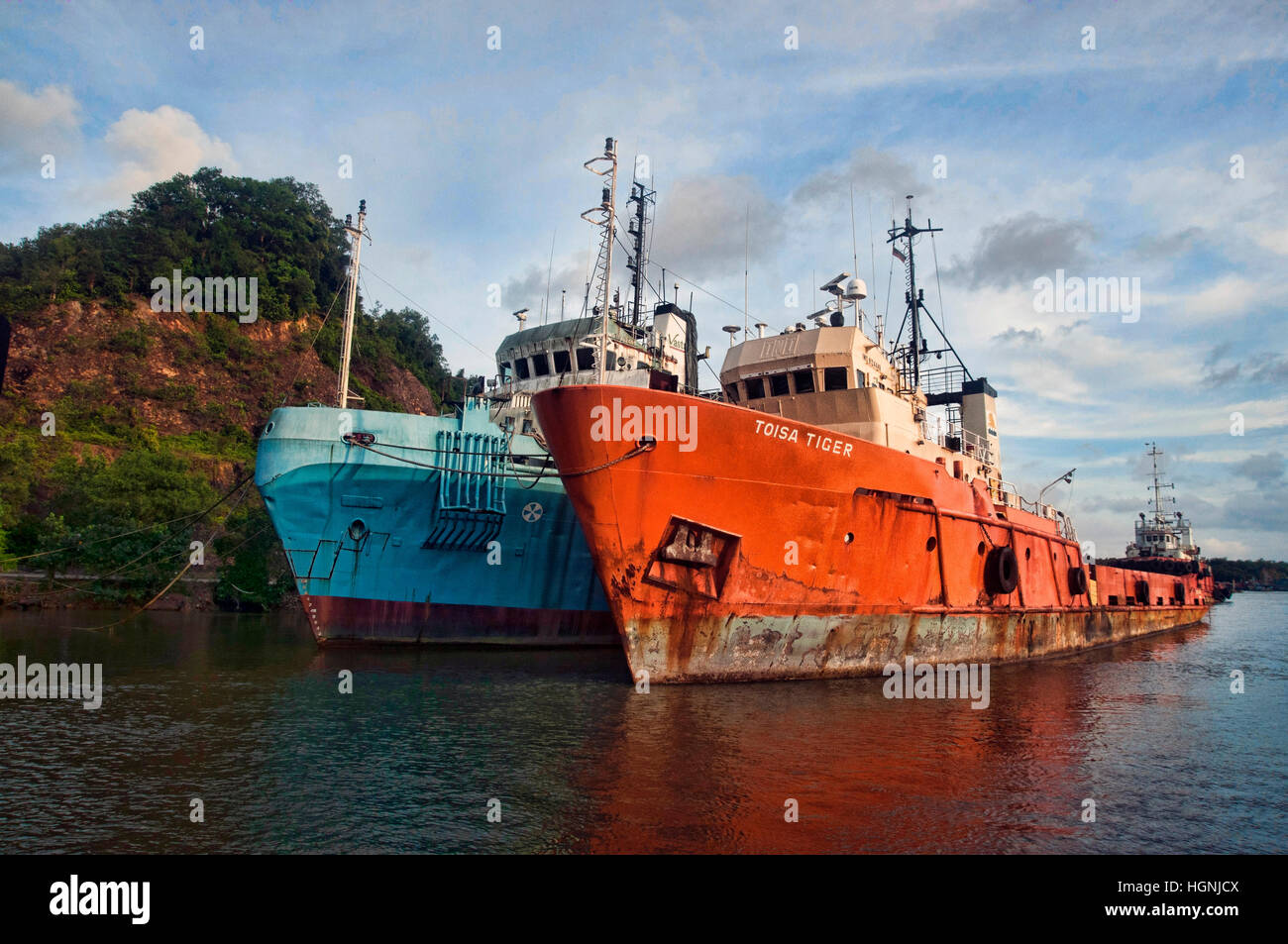 offshore vessel berthing at river due low market demand Stock Photo