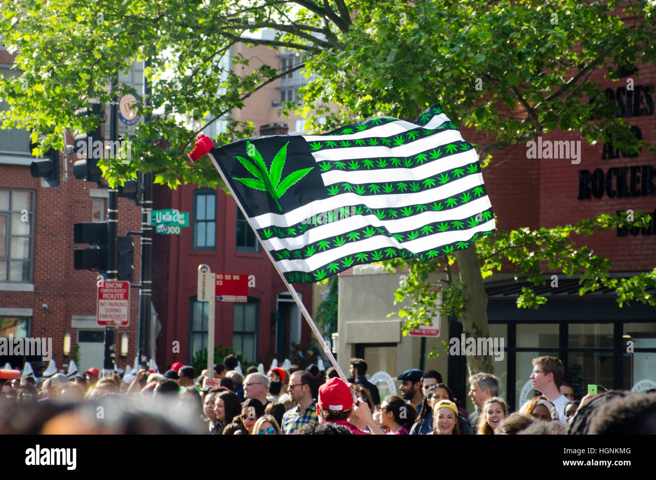 Marchers carry a green marijuana freedom flag at the Funk Parade, U Street NW. Stock Photo