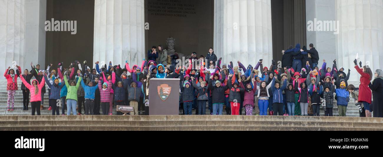 Elementary school students end their recital of the 'I Have a Dream' speech from the steps of the Lincoln Memorial. Stock Photo