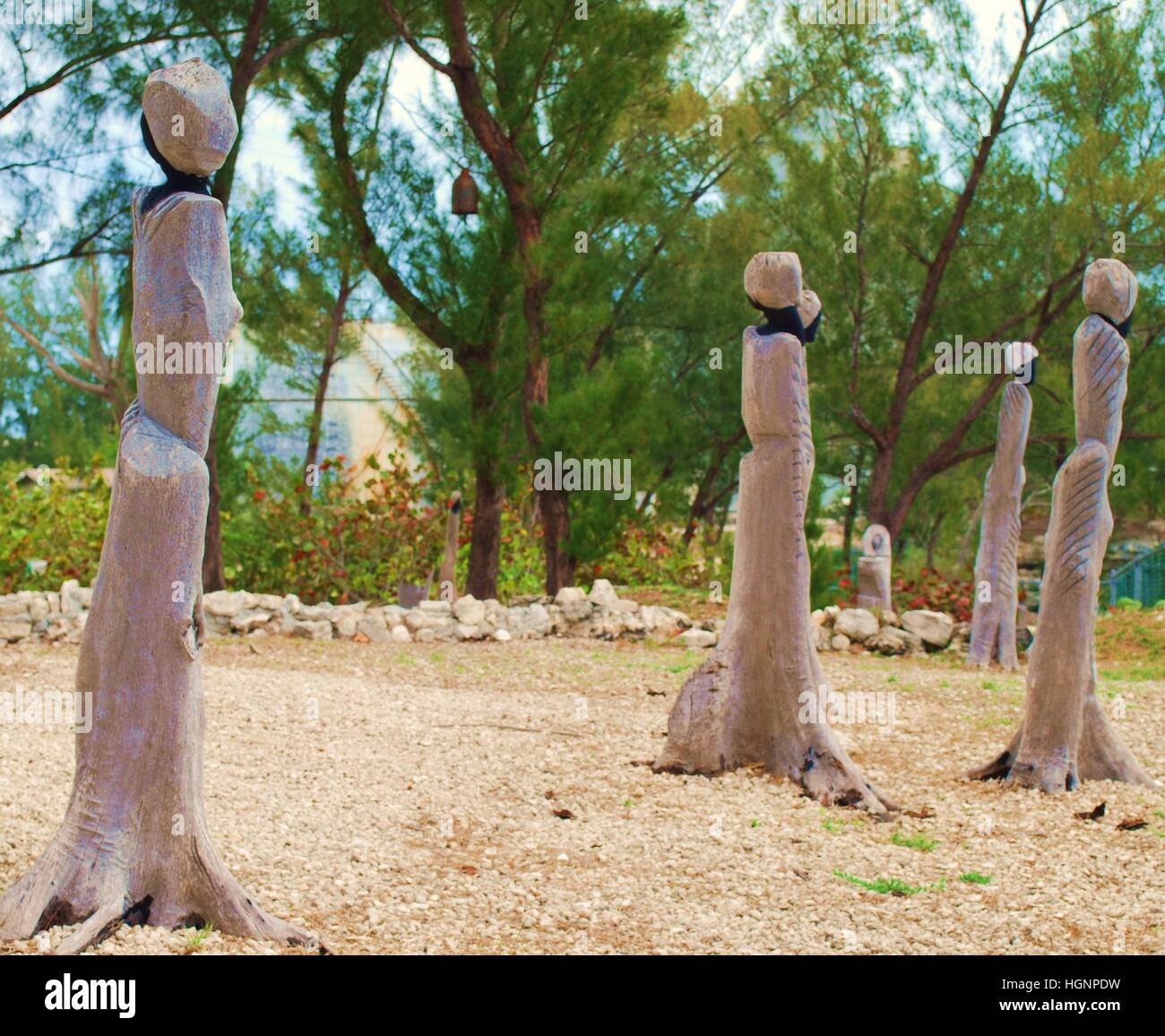 wooden sculptures on the beach Stock Photo Alamy