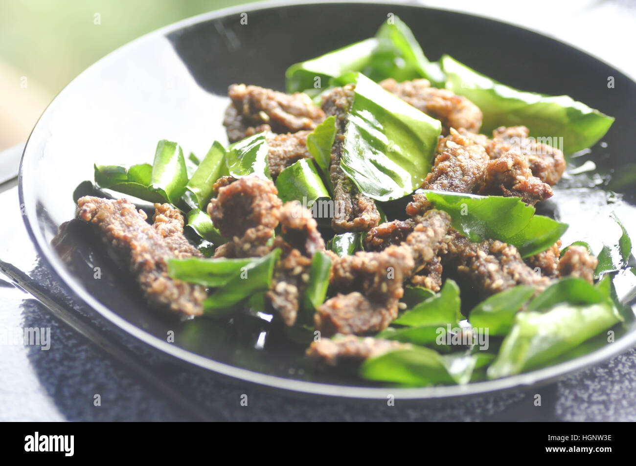deep fried beef or Deep fried marinated beef with leech lime leaf (Thai