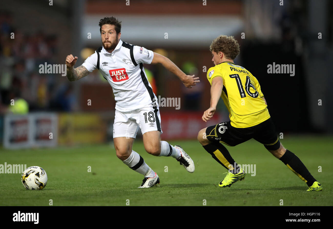 Derby County's Jacob Butterfield (left) and Burton Albion's Matt Palmer Stock Photo