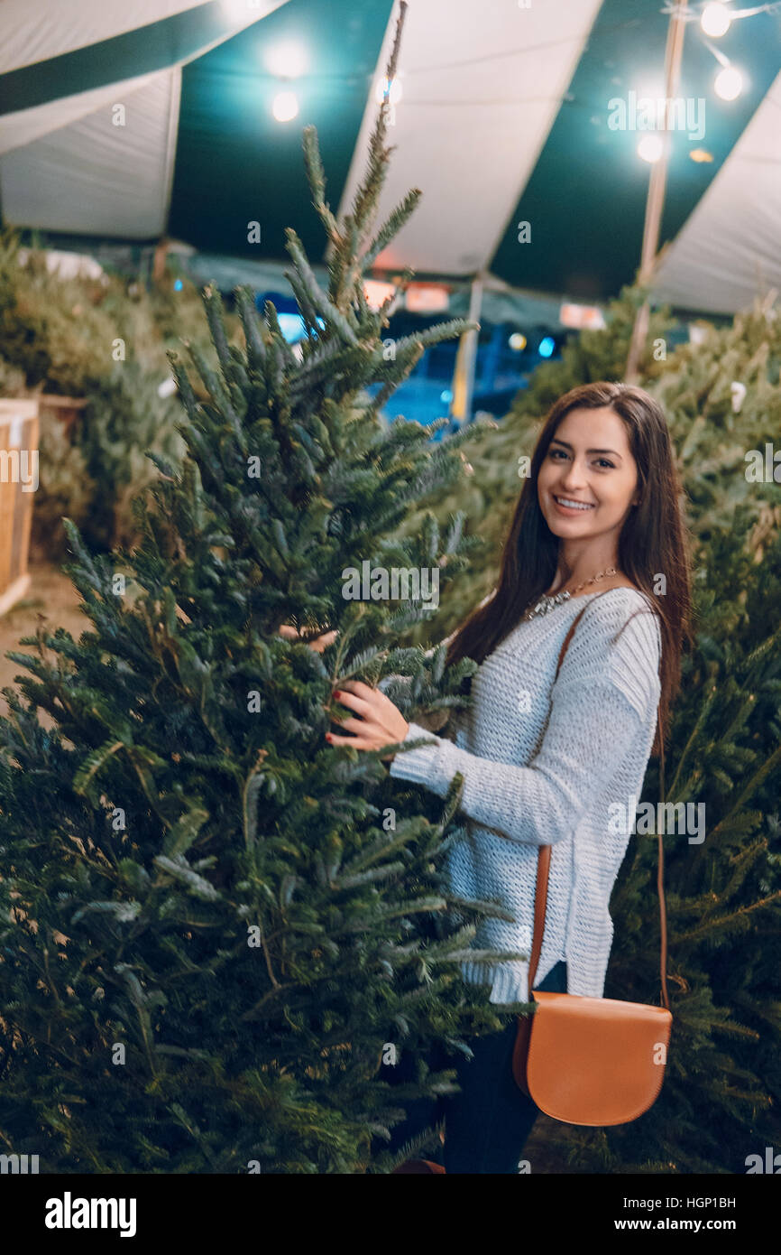 girl and Christmas tree Stock Photo - Alamy