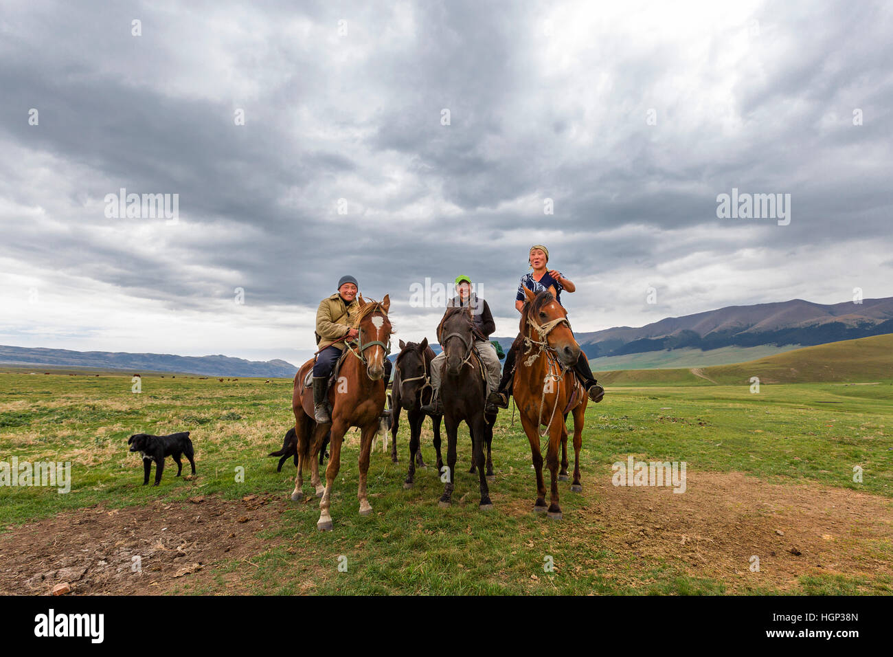 Kazakh nomadic horsemen in the Assy Plateau in Kazakhstan. Stock Photo
