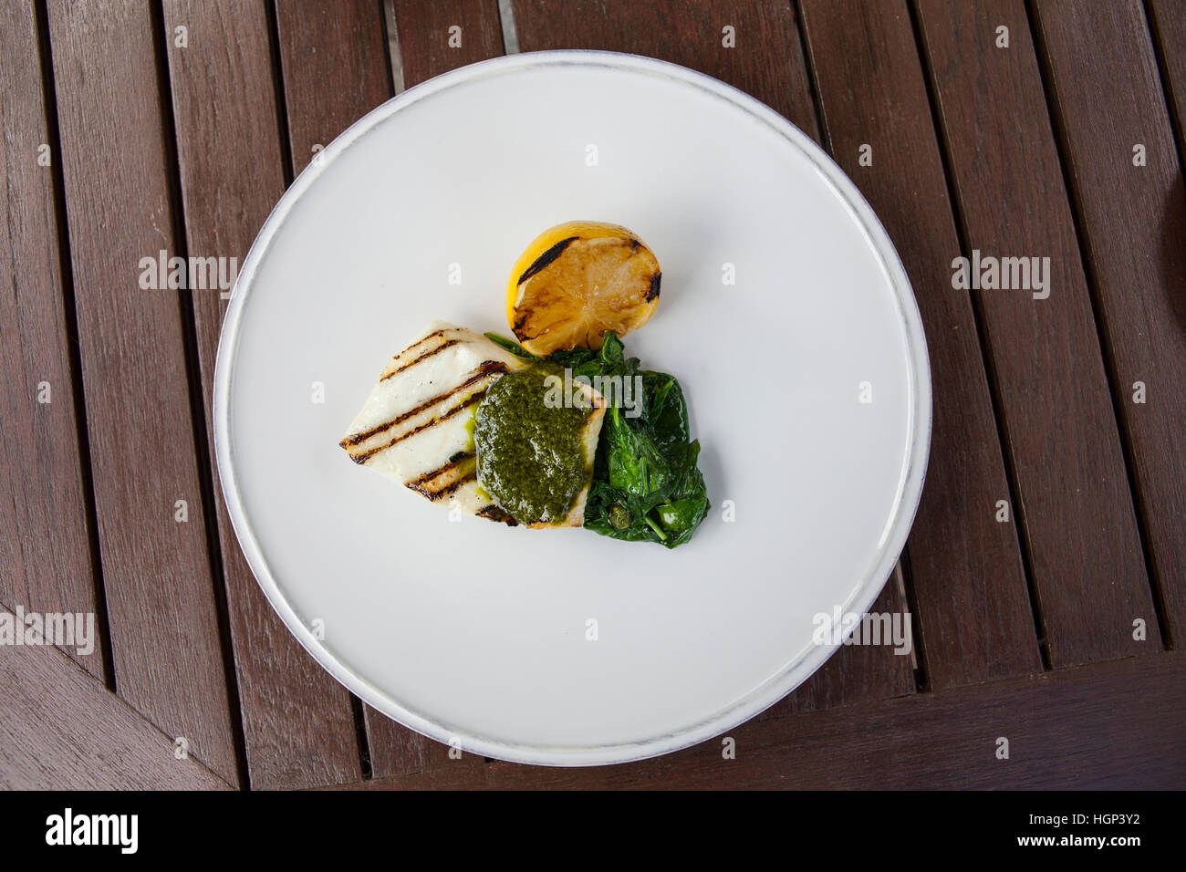 Grilled Halibut with salsa verde. Astor Grill Stock Photo Alamy