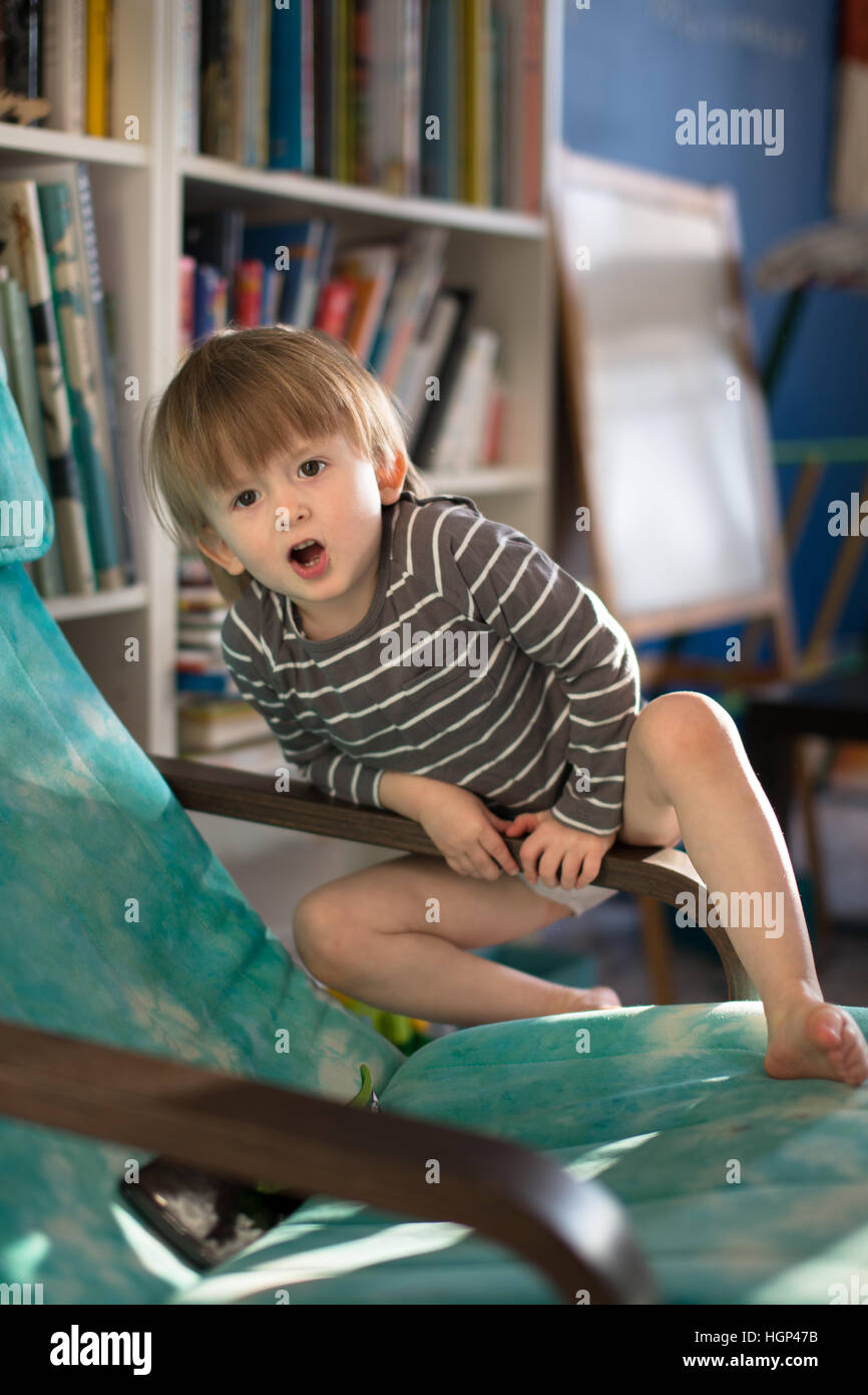 Toddler climbing chair hires stock photography and images Alamy