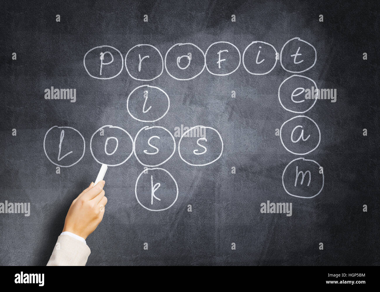 Woman draw crossword Stock Photo Alamy