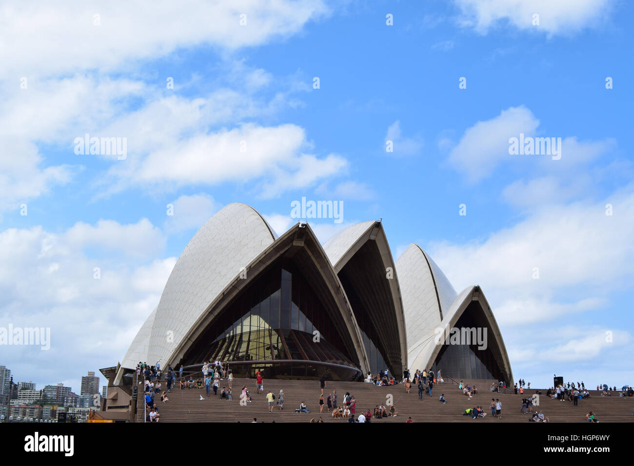 The Sydney Opera House SOH on Bennelong Point next to the Sydney Harbor Bridge and Harbor in Australia, New South Wales Stock Photo