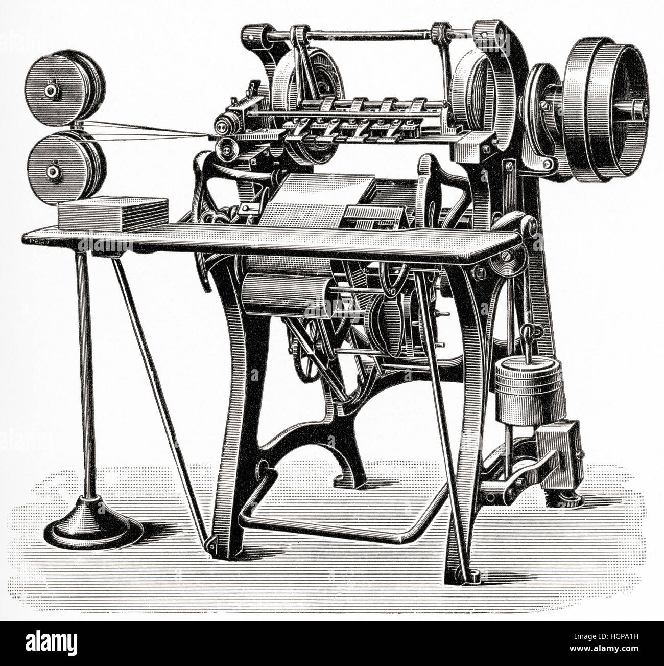 An early bookbinding machine that stitched books from a coil of wire.  From Meyers Lexicon, published 1924. Stock Photo