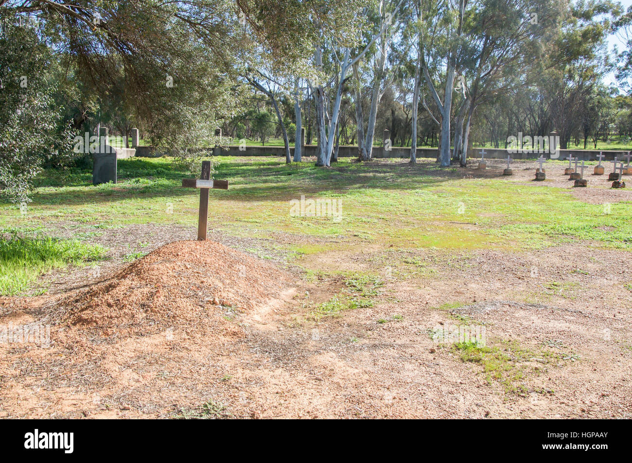 Burial plot mound with cross in the New Norcia Cemetery with