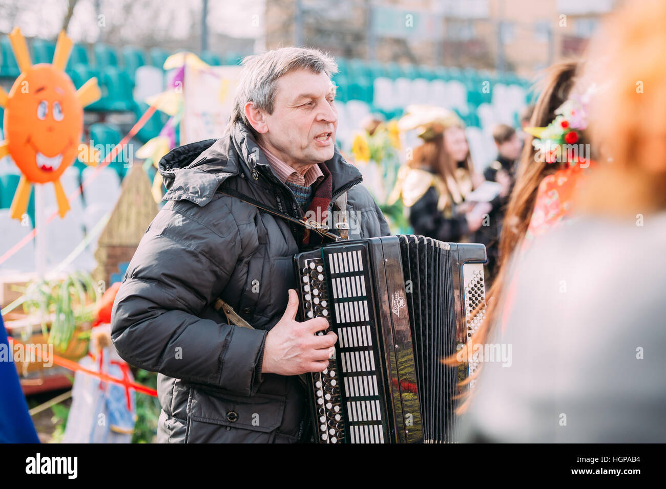 Gomel, Belarus - March 12, 2016: Unknown man plays the accordion folk
