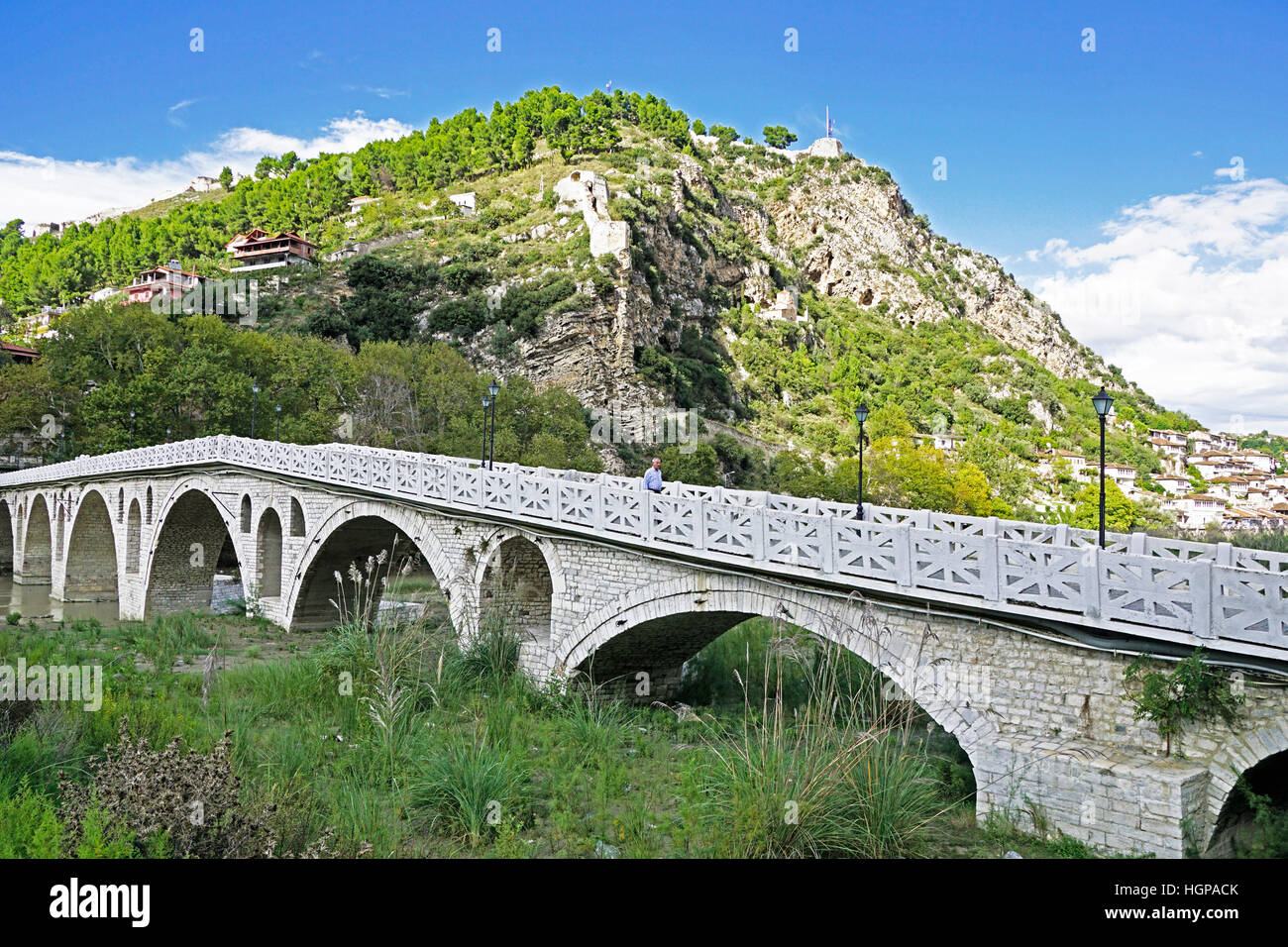 Gorica Bridge over Osum River at Berat is 18th century historical Ottoman structure for pedestrians. Stock Photo