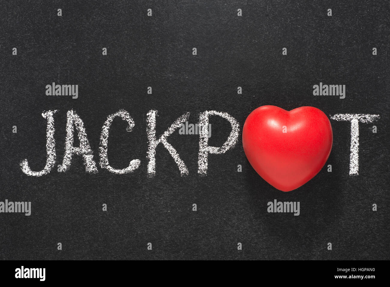 jackpot word handwritten on blackboard with heart symbol instead of O Stock Photo