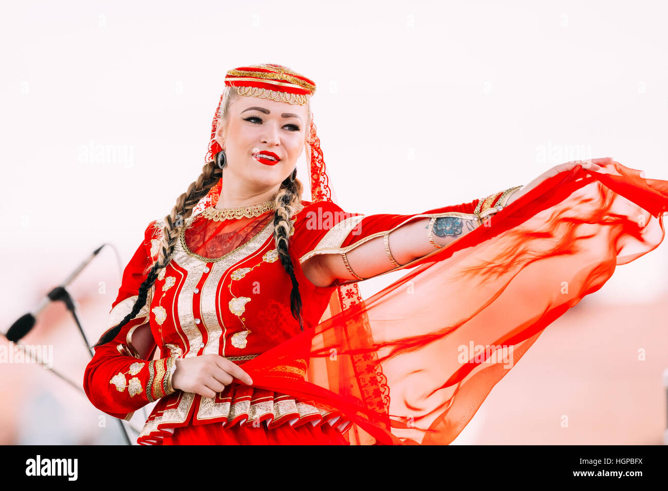 Azerbaijani people in traditional dress hi-res stock photography and