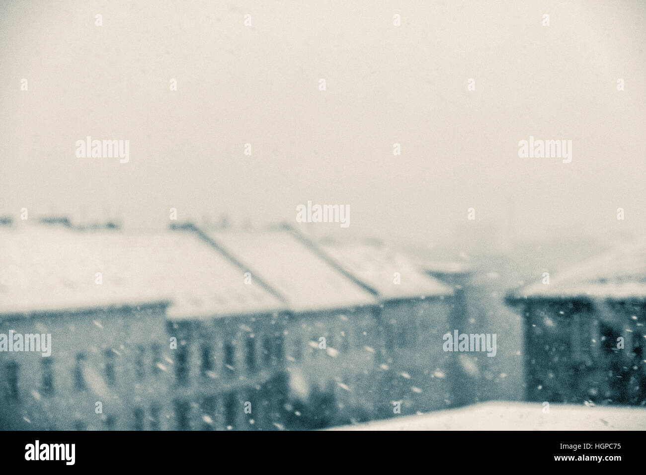winter panorama, snowing on city skyline - vintage look Stock Photo