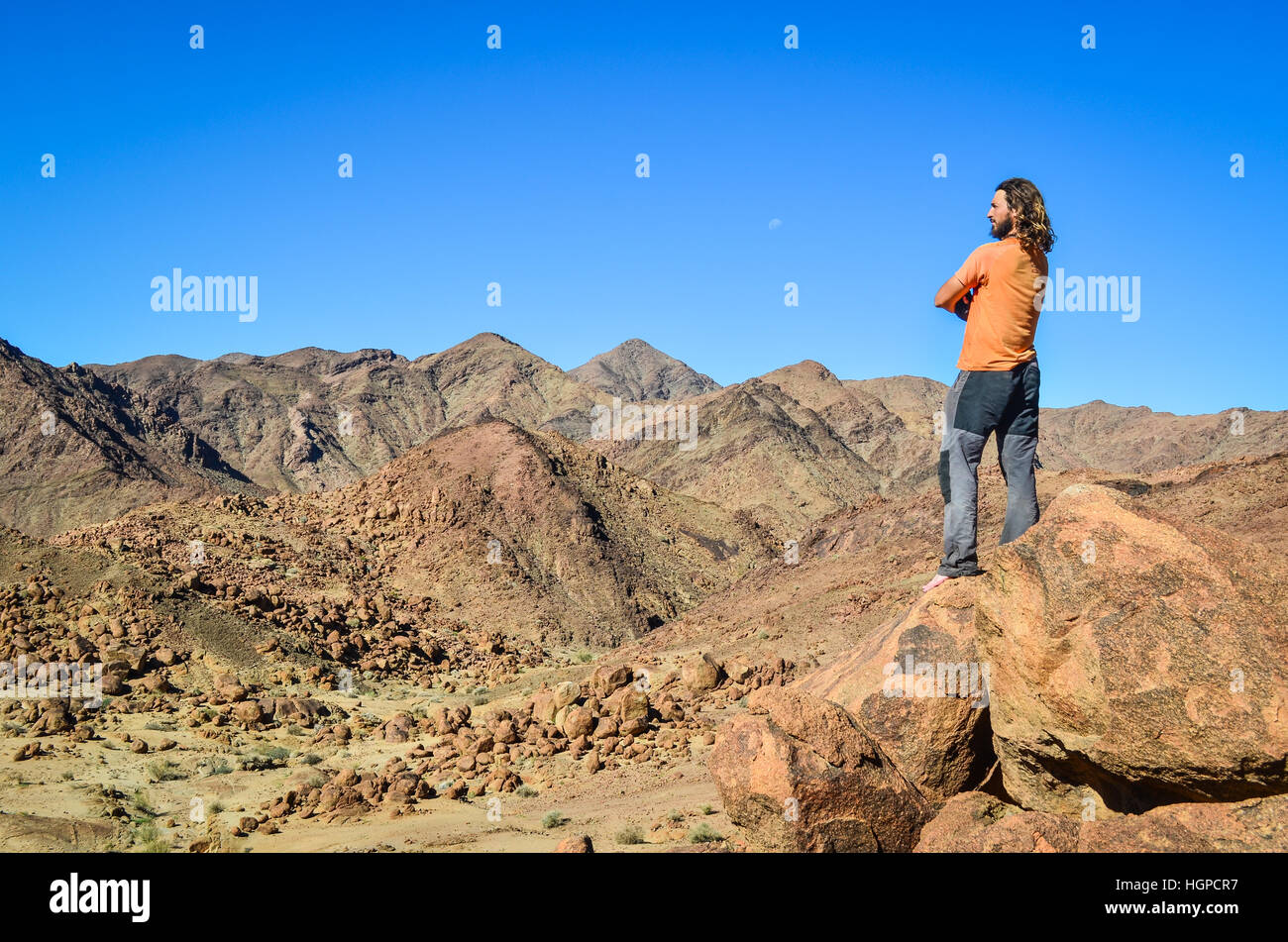 Adventurer standing in the mountains of the Ai-Ais Richtersveld transfrontier park Stock Photo