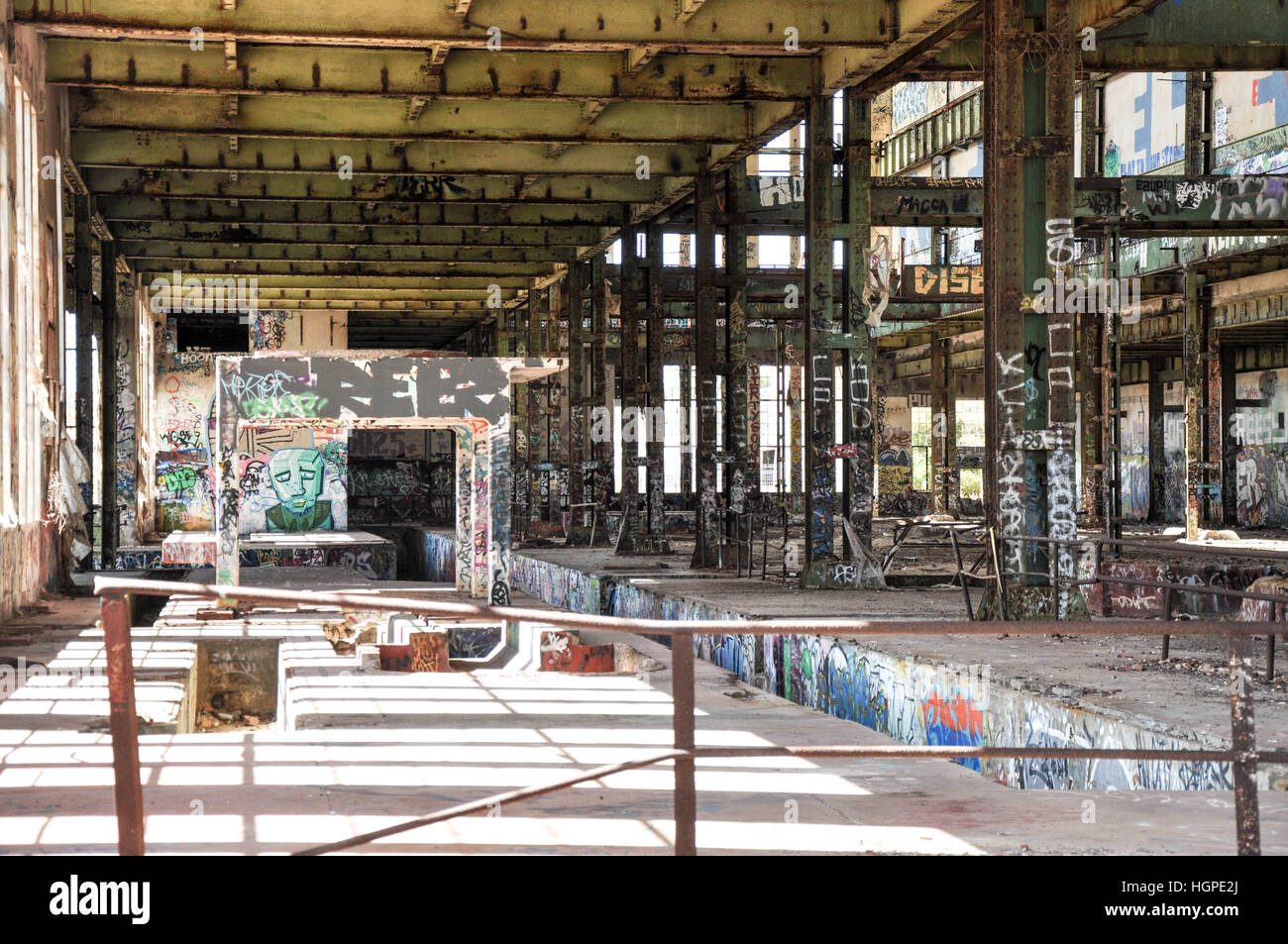 Old abandoned South Fremantle Power Station with youth tagging, broken windows and empty shell