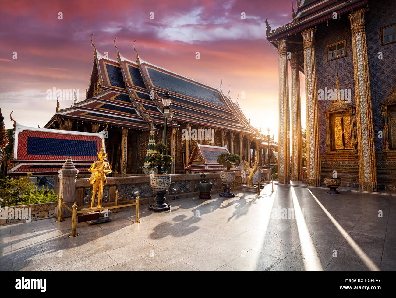 Temple of the Emerald Buddha Wat Phra Kaew in Bangkok at sunset Stock Photo