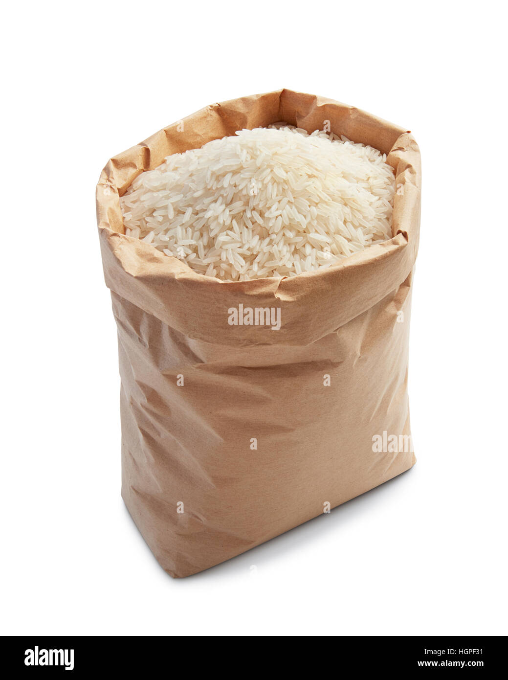 white rice in paper bag isolated on white Stock Photo