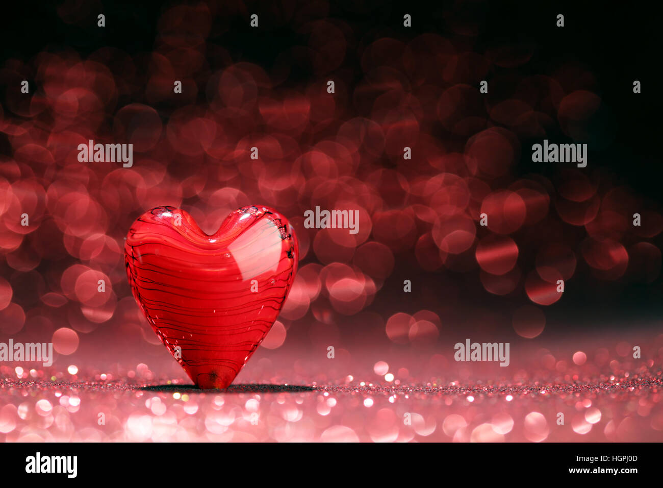 Shiny red heart background Stock Photo