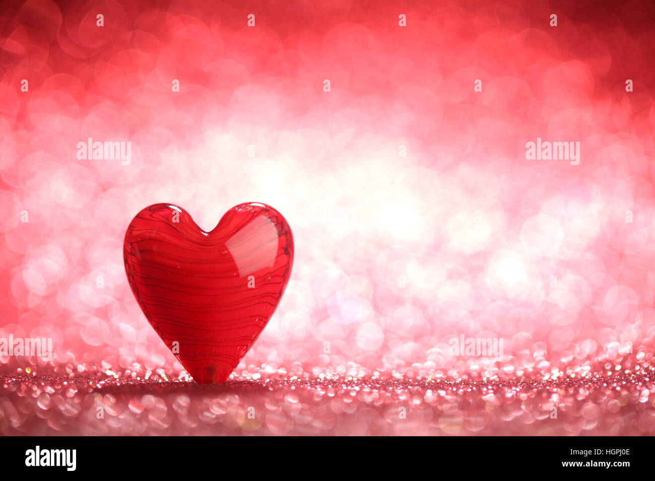 Shiny red heart background Stock Photo