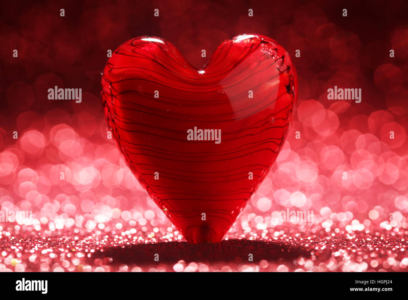 Shiny red heart background Stock Photo