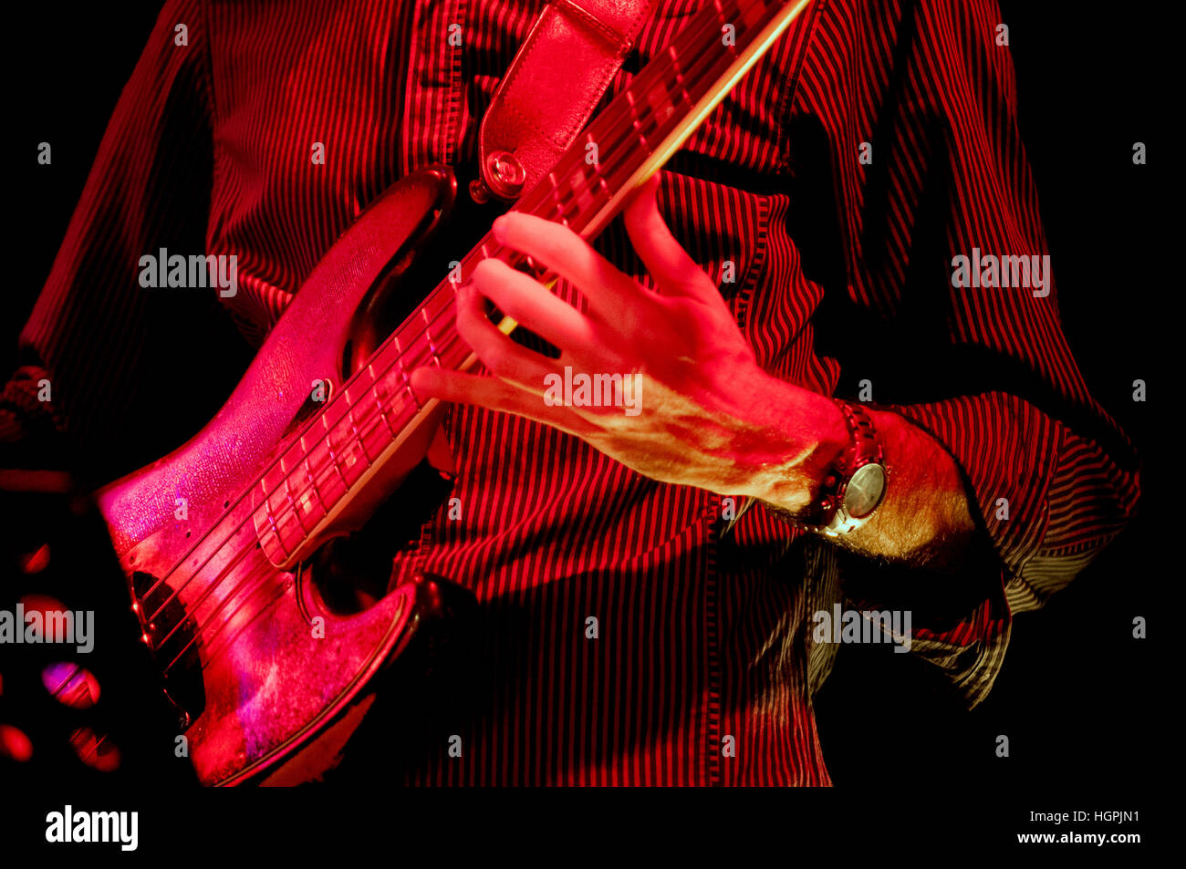 bass guitar player live on stage Stock Photo Alamy