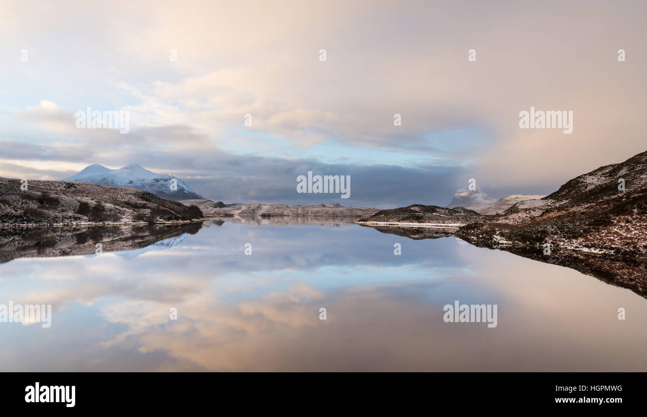 Assynt landscape in north-west scotland in winter looking out over cam loch with cul mor and suilven in distance, near Elphin. Stock Photo