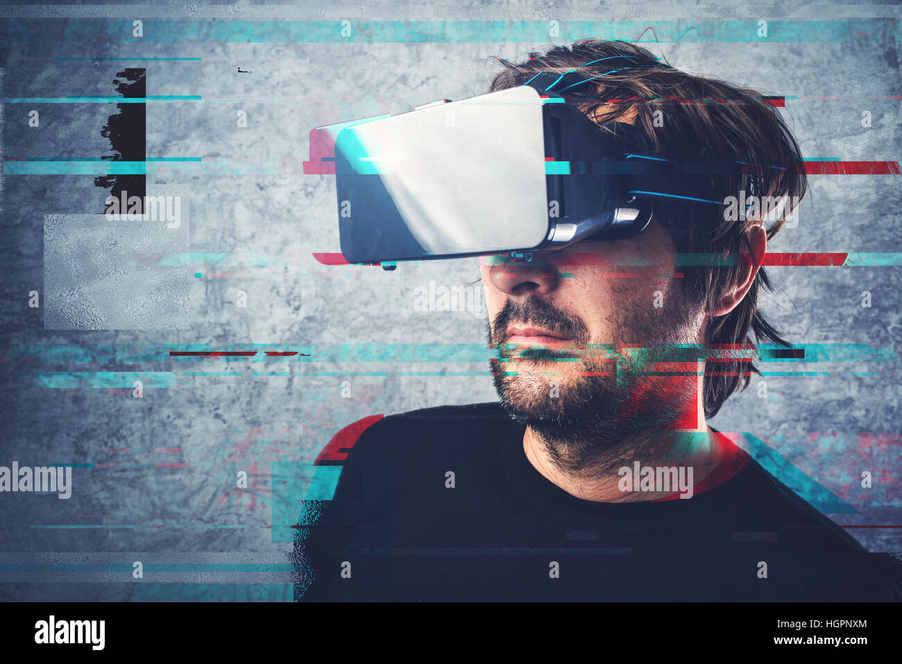 Man with 3d virtual reality headset and digital glitch effect Stock