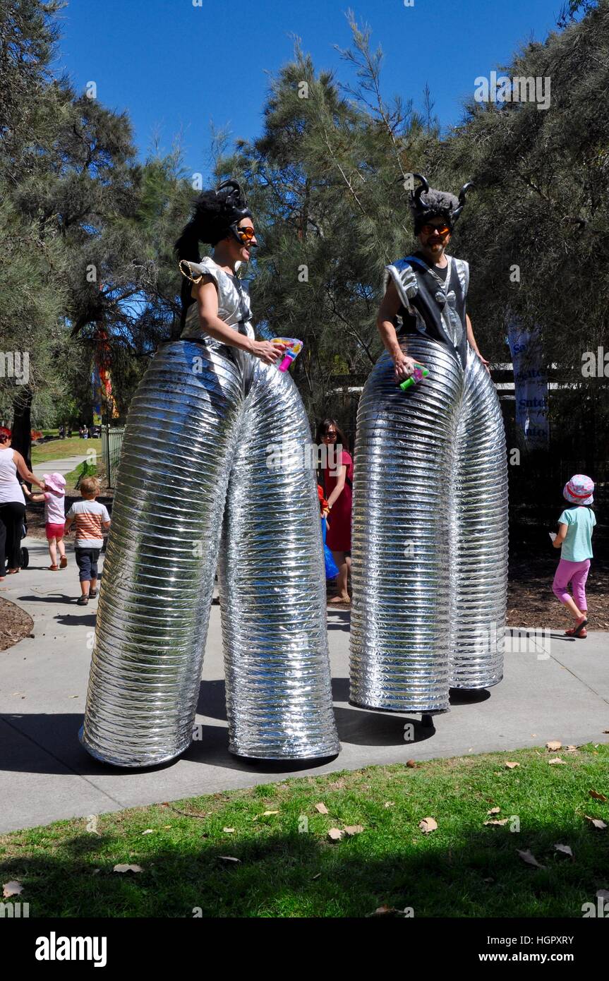 Perth,WA,AustraliaSeptember 19,2014 Space age stilt walkers