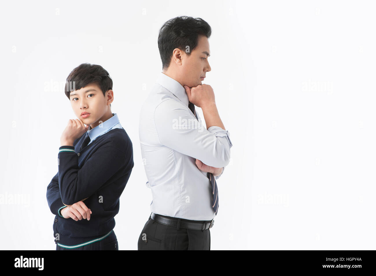 Side view of teacher and school boy worried Stock Photo