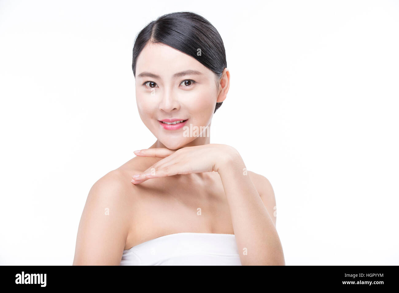 Portrait of young woman in tube top clothes Stock Photo