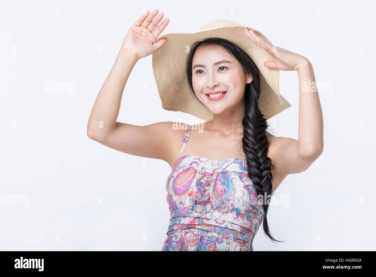 Portrait of young smiling woman in hat and summer dress Stock Photo - Alamy