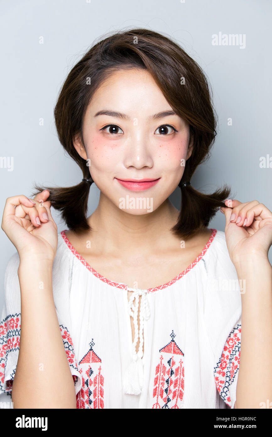 Smiling young woman freckles hi-res stock photography and images - Alamy