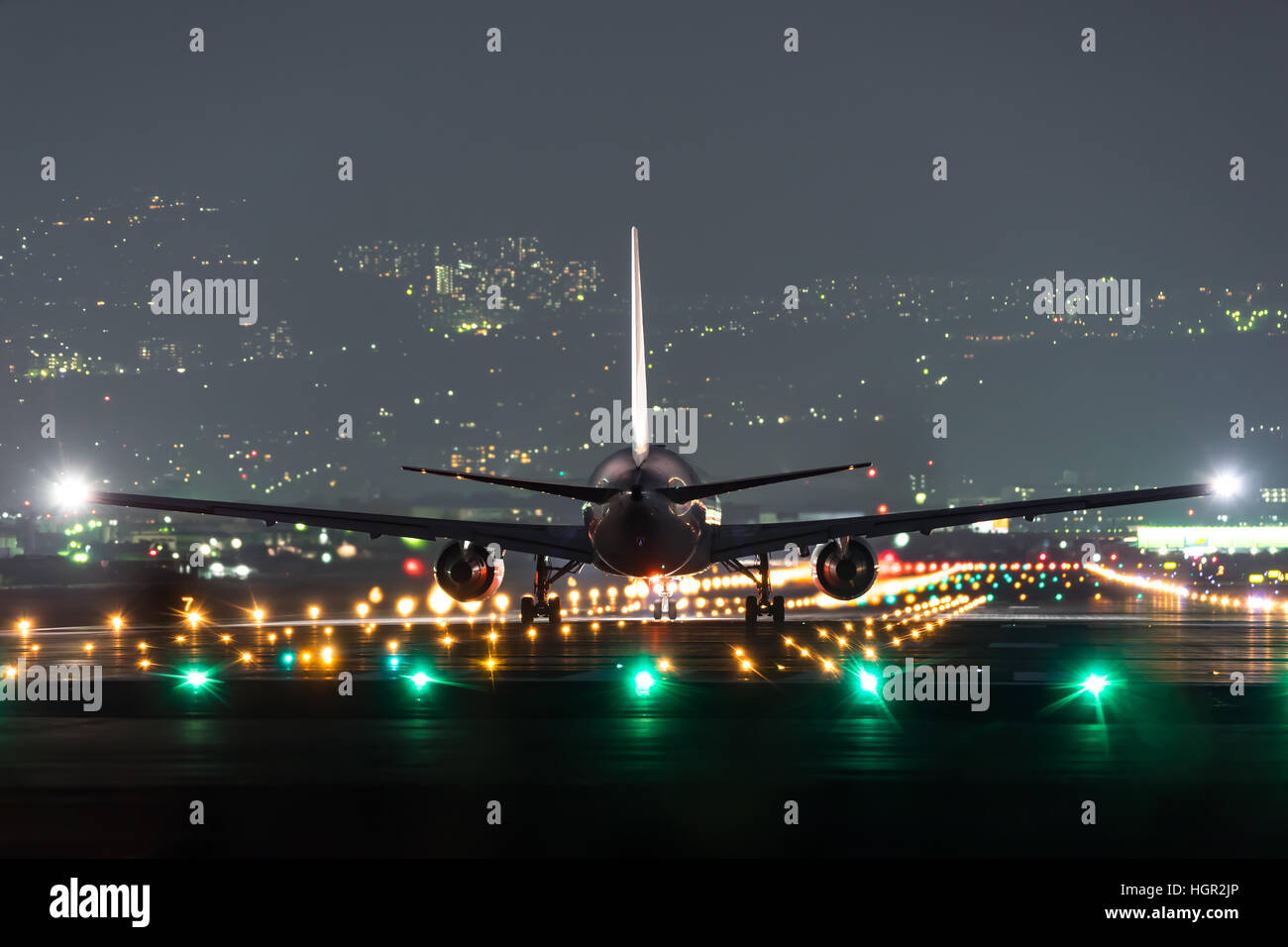 airplane taking off at night