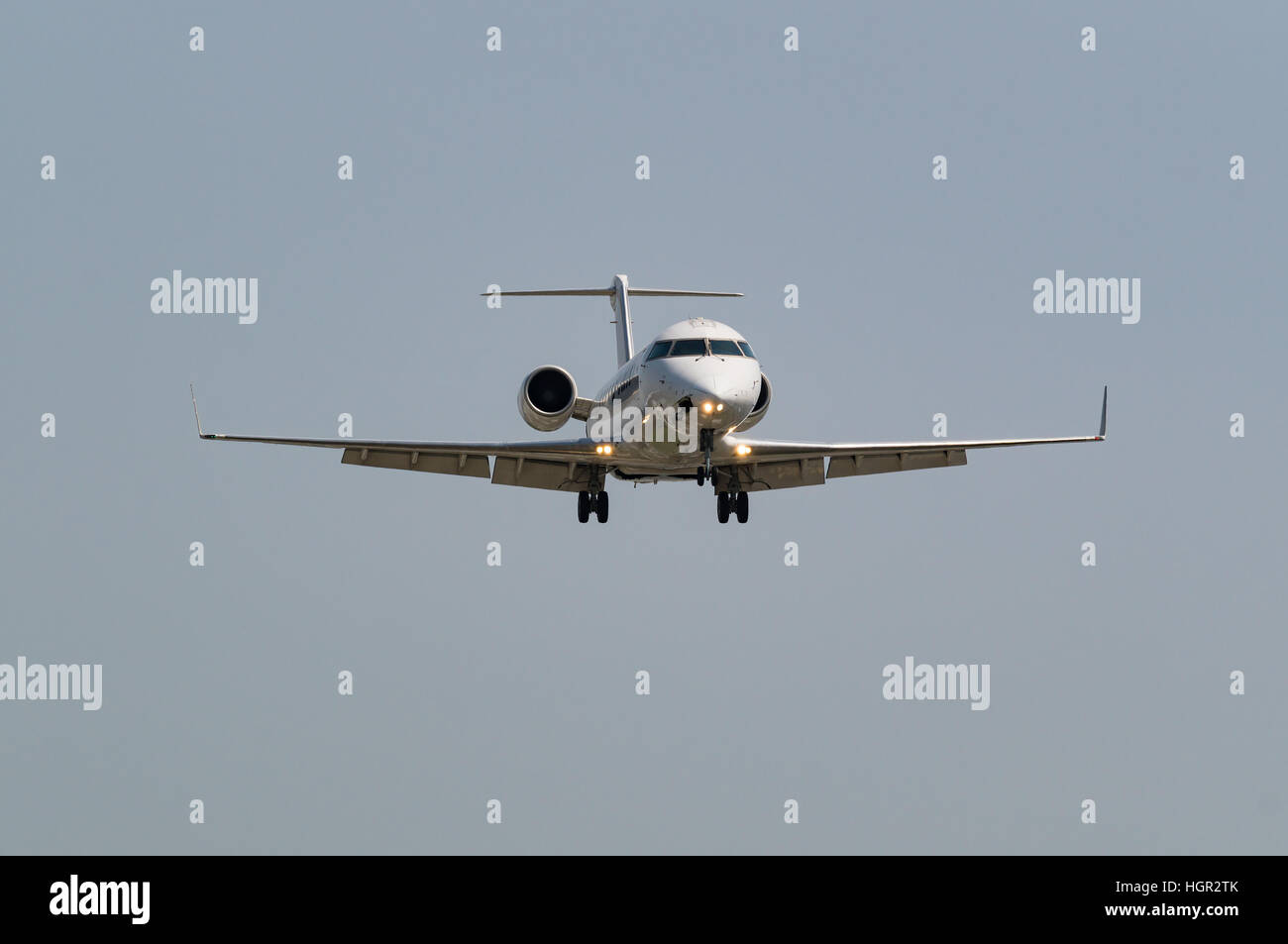 Airplane landing to the airport. Stock Photo