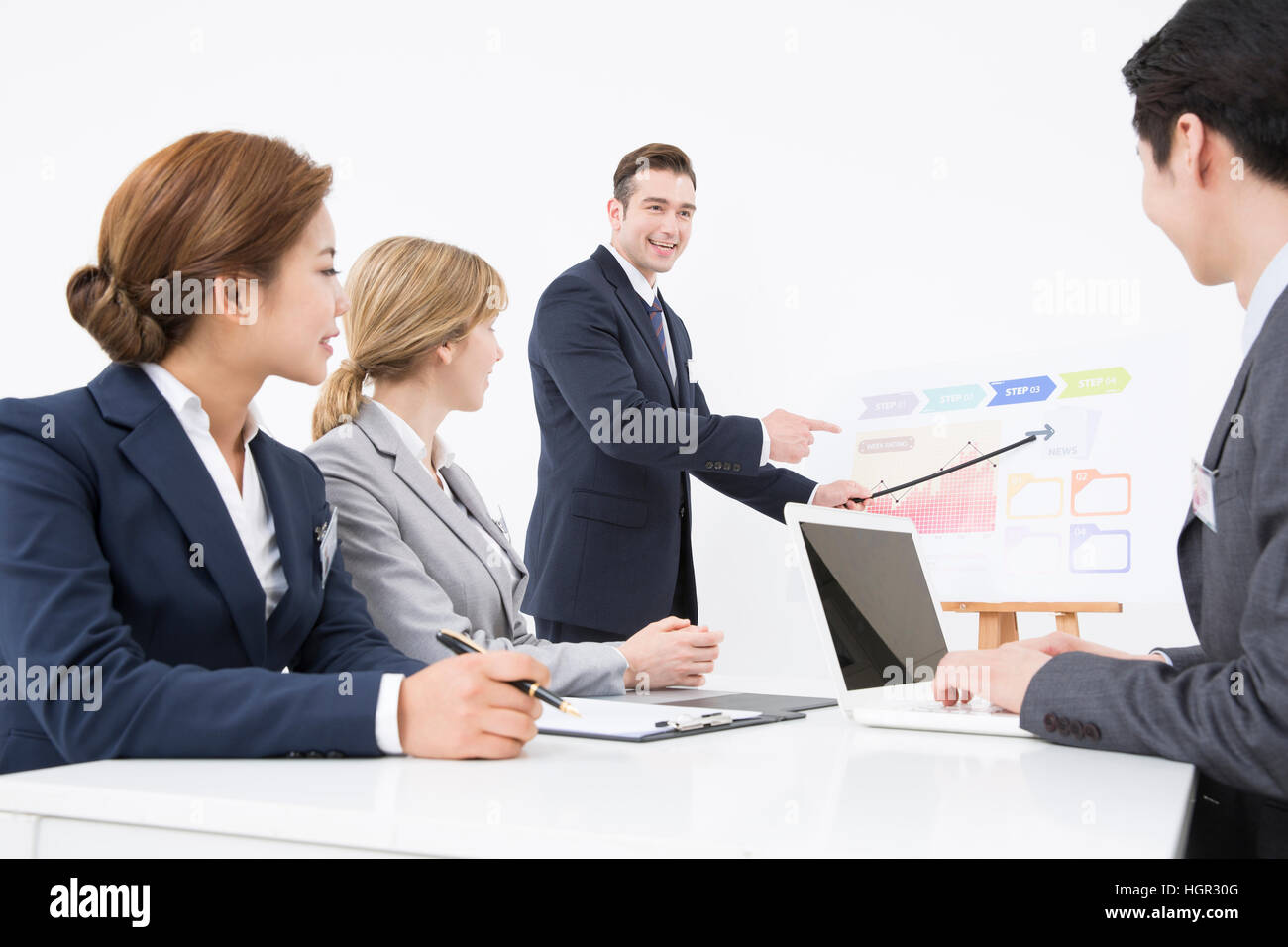 Global business people at presentation Stock Photo