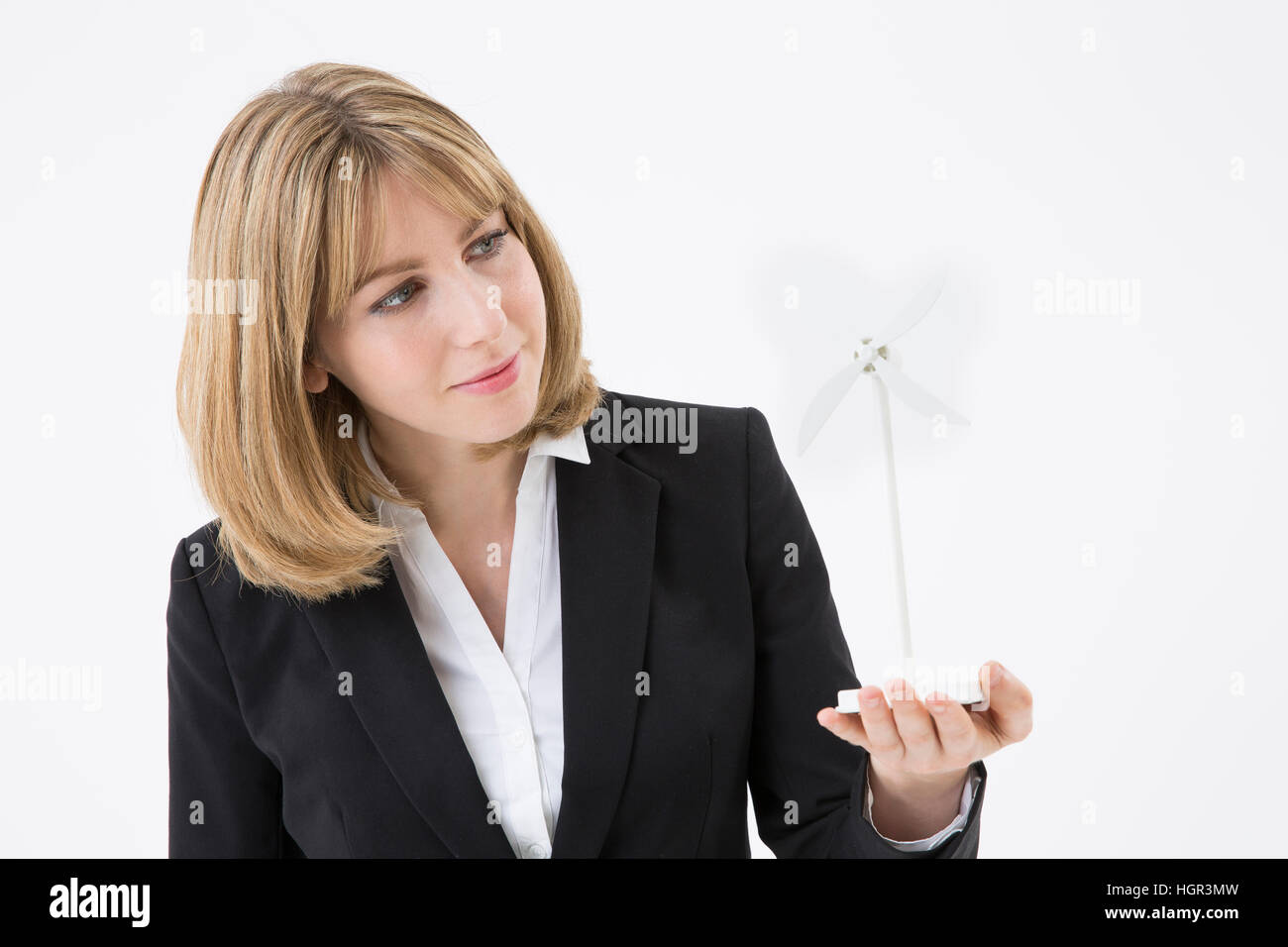 Portrait of global businesswoman with pinwheel Stock Photo - Alamy