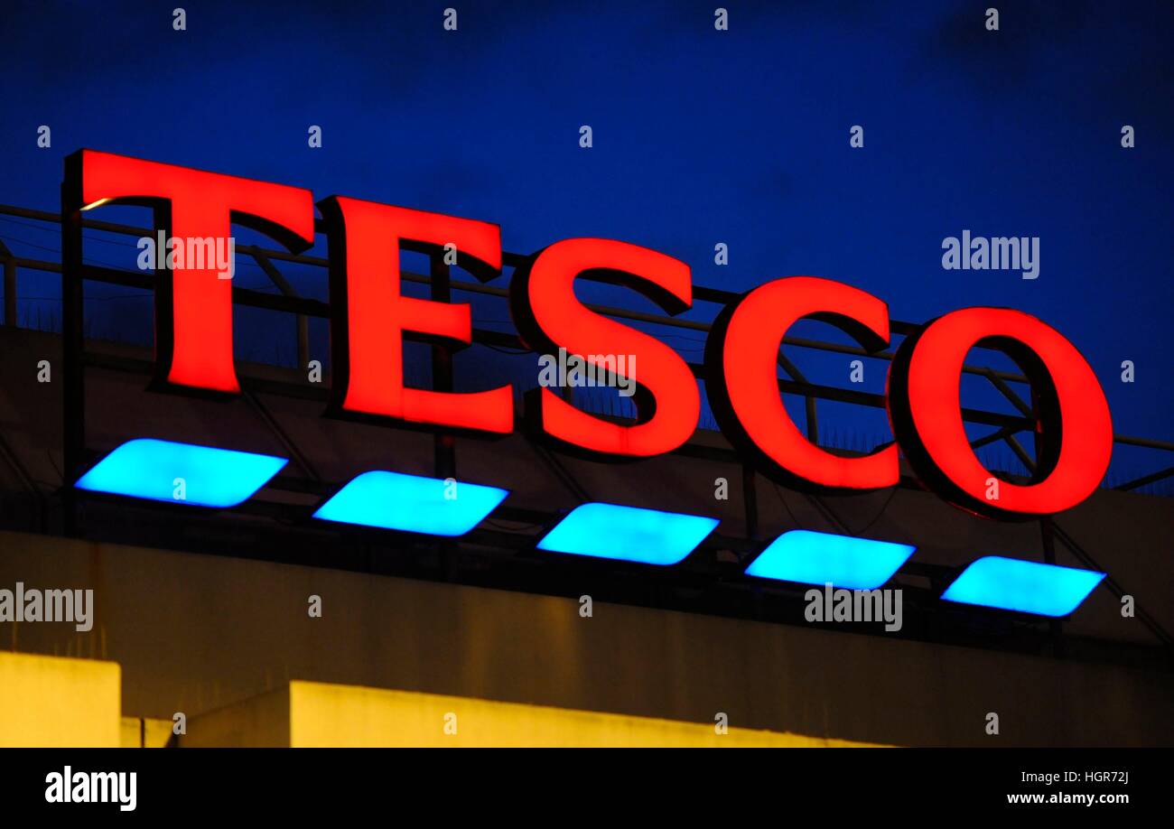 General view of a Tesco sign in Brixton, London, as the supermarket giant reported a 0.7% rise in like-for-like sales over the festive season, helping to record a 1.8% increase in third quarter sales. Stock Photo