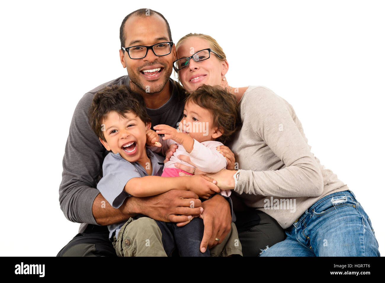 Happy interracial family isolated on white Stock Photo