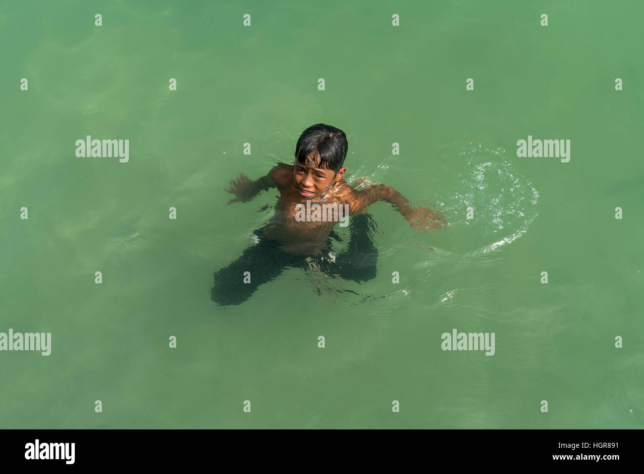 Boy swimming at Serendipity Beach in Sihanoukville, Cambodia, Asia Stock Photo